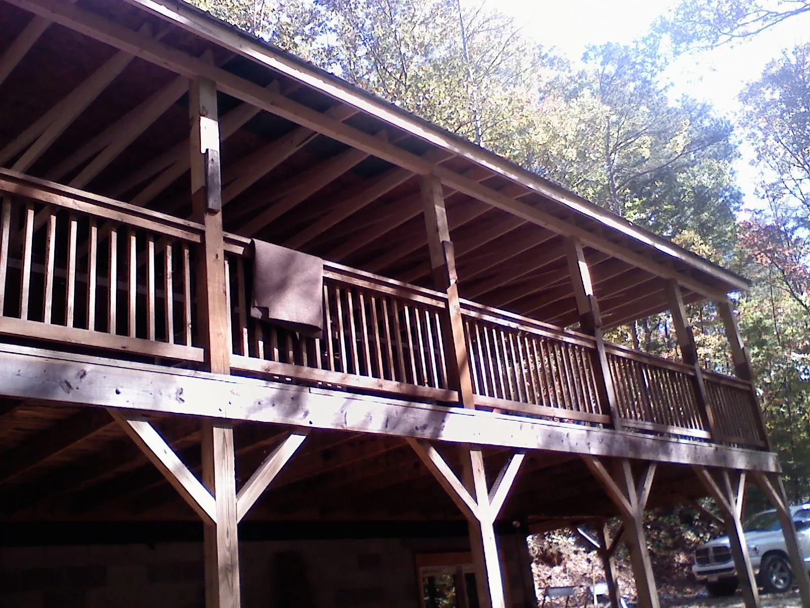 Timber framing under a new elevated porch and deck — Roof Leak Repair in Missouri Valley by Roofing Brothers
